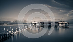 Small fishing houses on stilts on the lake Mesologgi