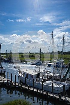 Small Fishing and Shrimp Boat Docked in Late Afternoon Sunlight