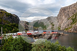 Small fishing village of Nusfjord with wooden houses in Lofoten, Norway.