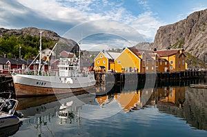 Small fishing village of Nusfjord with wooden houses in Lofoten, Norway.