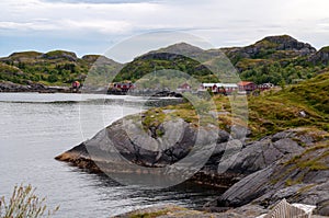 Small fishing village of Nusfjord with wooden houses in Lofoten, Norway.