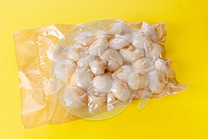 Small flat onions in vacuum packed