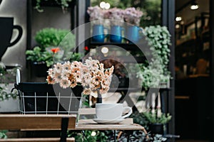 Small flower shop in center of city with beautiful outside display