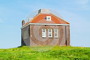 Small foghorn house in old harbour of former island Schokland, N