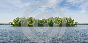 Small foresty island on a big lake
