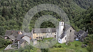 Small forgotten traditional village and church, lost on the Italian Swiss Alps near Locarno