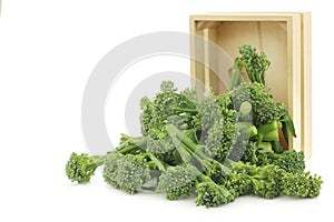 A small form of broccoli, called bimi, in a wooden box