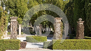 Small fountain on a plaza in the gardens of the Palacio de los Cordova in Granada, Spain.