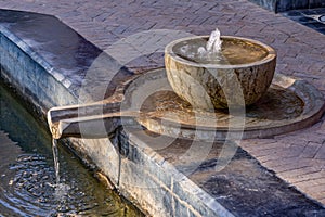 Small fountain of water in a gardern