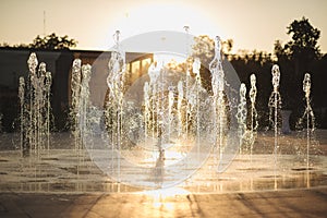 Small fountain with water streams beating from below