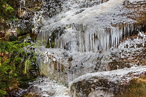 Small frozen water falls in winter time in rural Ohio