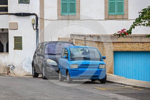 Small funny blue car parked Cala Figuera Mallorca Spain