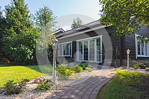 Small garden in front of the countryhouse, summertime