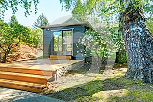Small garden studio in a separate room with window walls. photo