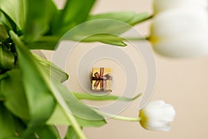 Small Gift Box Amongst White Tulip Petals