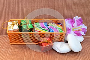 Small gift boxes in steel basket