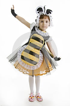 Small girl is bee costume