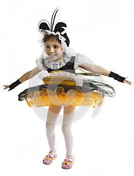 Small girl is bee costume. Flying bee.