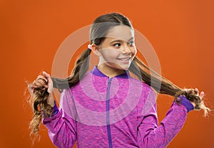 Small girl child. Hairdresser for kids. childrens day. Portrait of happy little child. Kid fashion and sportswear