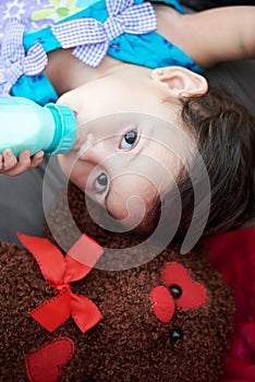 Small girl drink milk