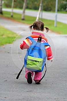 Small girl large backpack