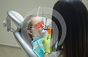 Small girl patient at the dentist