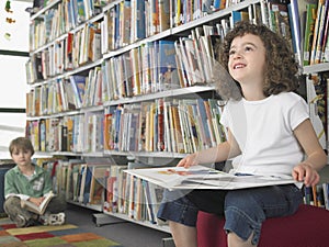 Small Girl Reading Book