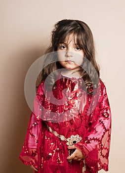 Small girl with red dress