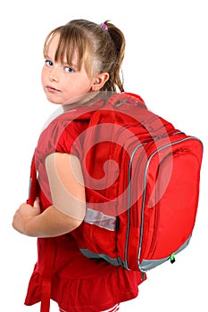Small girl with red school bag isolated on white photo