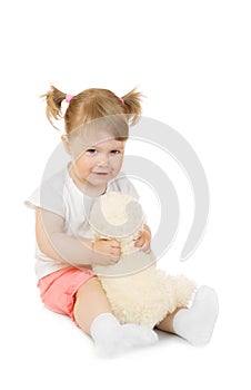 Small girl with toy bear isolated