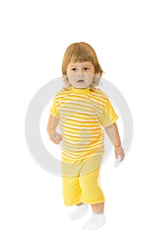 Small girl in yellow shirt and pants