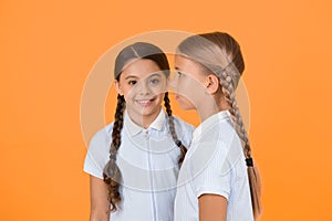 small girls in retro uniform. old school fashion. back to school. happy beauty with pigtails. happy childhood. brunette