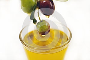 Small glass bowl with olive oil.