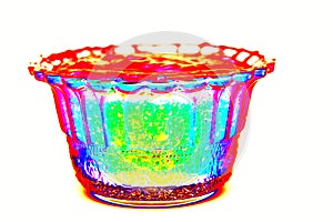 Small glass bowl of red berry jam on a white background, cherry jam, altered color scheme.