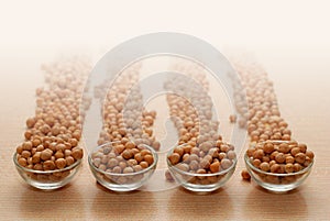 Small Glass Bowls with Chickpeas in Rows