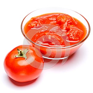 Small glass condiment bowl of red tomato sauce ketchup of peree