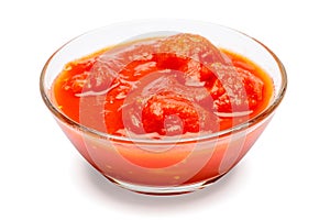 Small glass condiment bowl of red tomato sauce ketchup of peree