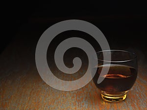 A small glass scotch whiskey