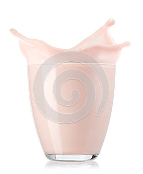small glass of strawberry yogurt with splash