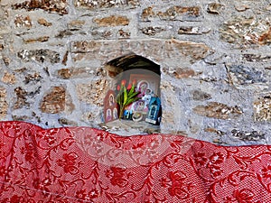 Small Greek Orthodox Icons in Small Nook in Stone Wall, Greece