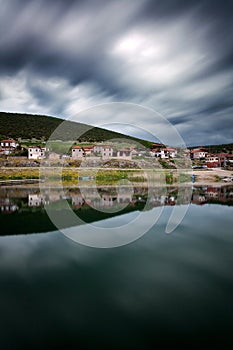 Small greek village by Lake Prespa. Long exposure shot with dram