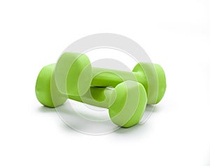 Small green dumbbells, isolated in white