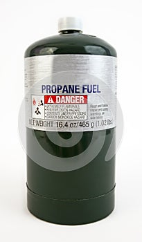 Small green propane tank