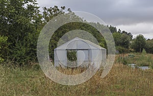 A small greenhouse in a farm in the countryside of Galicia, Spain.