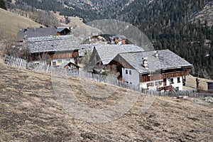 The small hamlet Fordora with its nice  historic, old houses is situated near to the village La Pli de Mareo in the Dolomites photo