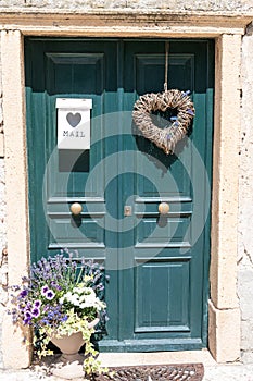 Small hand-decorated wooden door photo