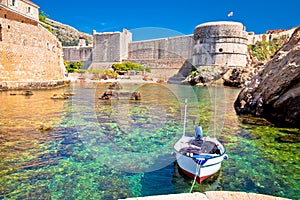 Small harbor under Dubrovnik city walls view