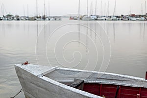 Small harbor with yachts and sail boats in at sunset