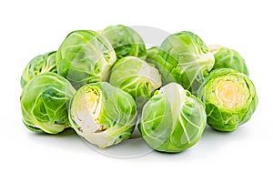 Small heap of brussels sprouts on white background