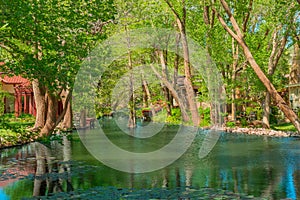 A small hideaway lake in Ransom Canyon in Texas is lined with homes